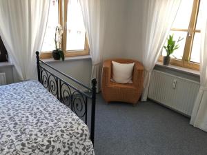 Postel nebo postele na pokoji v ubytování Gästehaus Moin Allgäu