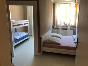 Postel nebo postele na pokoji v ubytování Gästehaus Moin Allgäu