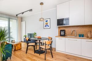 Kuchyňa alebo kuchynka v ubytovaní Plac Unii Apartament Gdynia
