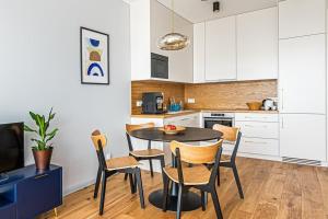 Kuchyňa alebo kuchynka v ubytovaní Plac Unii Apartament Gdynia