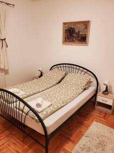 A bed or beds in a room at Agape 2
