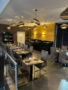 乐米迪酒店餐厅或其他用餐的地方