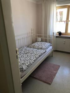 Postel nebo postele na pokoji v ubytování Gästehaus Moin Allgäu