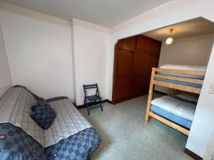 Ένα ή περισσότερα κρεβάτια σε δωμάτιο στο 6CONV21 Maison de pêcheur au Faubourg