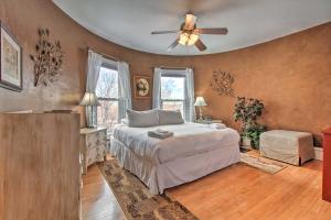 a bedroom with a bed and a ceiling fan at Historic Helena Home with Mtn Views - 2 Mi to Dtwn! in Helena
