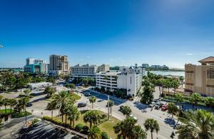an aerial view of a city with palm trees and buildings at Waterfront Breeze Condo in Clearwater Beach