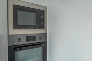 Kuchyňa alebo kuchynka v ubytovaní Apartament Widok 5