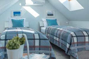 Posteľ alebo postele v izbe v ubytovaní Apartament Widok 5