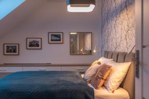 Posteľ alebo postele v izbe v ubytovaní Apartament Widok 5