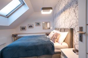Posteľ alebo postele v izbe v ubytovaní Apartament Widok 5