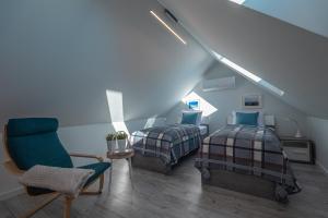 Posteľ alebo postele v izbe v ubytovaní Apartament Widok 5