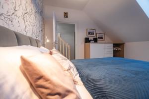 Posteľ alebo postele v izbe v ubytovaní Apartament Widok 5