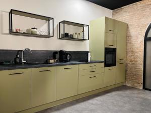 Kuchyňa alebo kuchynka v ubytovaní Loft atypique Dunkerque Centre