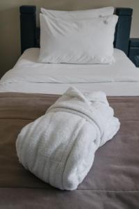 Postel nebo postele na pokoji v ubytování RUBEL APARTHOTEL&SPA