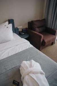 Postel nebo postele na pokoji v ubytování RUBEL APARTHOTEL&SPA