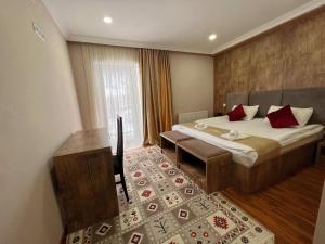 Letto o letti in una camera di Hotel Mountain Mestia