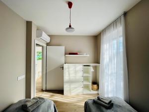 Postel nebo postele na pokoji v ubytování Babvirág Porta Fonyódliget