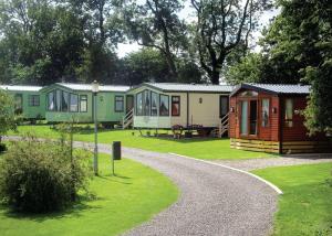 a row of mobile homes in a park at York House Country Park in Thirsk