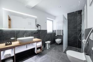 Koupelna v ubytování Albergo Garni Edy (B&B)