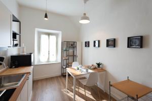 Kuchyň nebo kuchyňský kout v ubytování B&B Porta 93