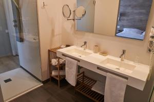 Koupelna v ubytování Hotel L'Algadir del Delta