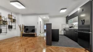 Kuchyň nebo kuchyňský kout v ubytování President Apartment with Sauna