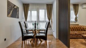 Posezení v ubytování President Apartment with Sauna