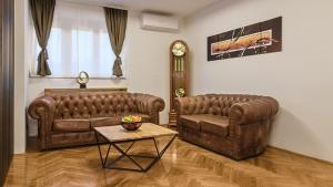 Posezení v ubytování President Apartment with Sauna