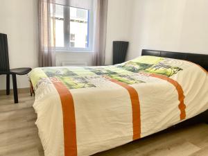 Posteľ alebo postele v izbe v ubytovaní Appartement Léonard, comme à la maison - Vieux Lille