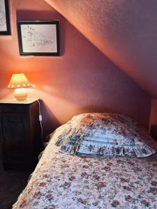 Posteľ alebo postele v izbe v ubytovaní labarretaine , une maison de caractère