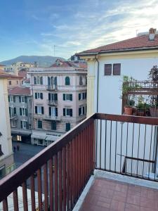 a balcony with a view of some buildings at Goito Gallery in La Spezia