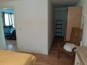 A bed or beds in a room at Wohnung Rheintal im Alpenvorland