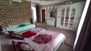 Voodi või voodid majutusasutuse Guest House Jekshen toas