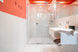 a bathroom with a shower and a sink at Gustava 27 in Graal-Müritz