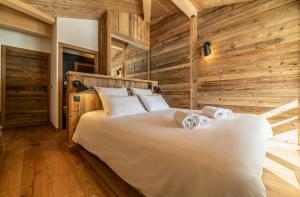 Posteľ alebo postele v izbe v ubytovaní Duplex Pen Men - LES GETS, proche du centre, jacuzzi, superbe vue