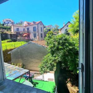 En have udenfor Appartement centre ville terrasse jardin garage chez Priscilla