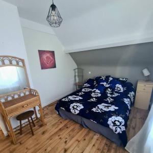 En eller flere senge i et værelse på Appartement centre ville terrasse jardin garage chez Priscilla