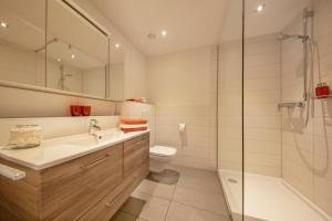 Ein Badezimmer in der Unterkunft Hotel & Boarding House Schlosserwirt