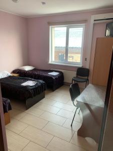Posteľ alebo postele v izbe v ubytovaní Green Hotel