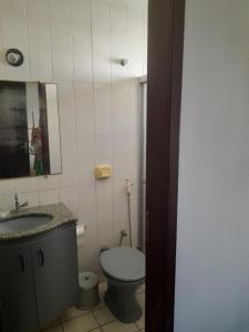 Ванная комната в Ap 300m praia do morro