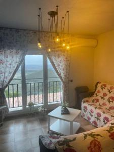 Posteľ alebo postele v izbe v ubytovaní Casa rural con piscina y vistas
