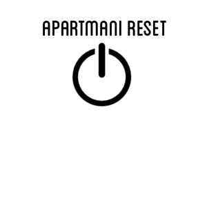 a button with the textarma reset and a circle at Apartman Reset in Pale
