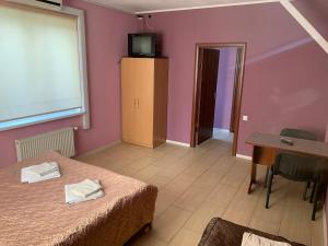 Posteľ alebo postele v izbe v ubytovaní Green Hotel
