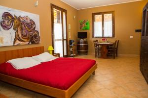 เตียงในห้องที่ Agriturismo I Casamenti