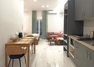 A kitchen or kitchenette at Mikalis Studio