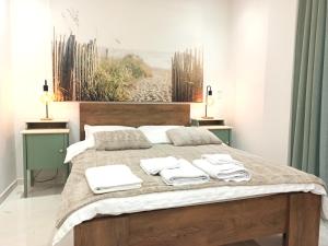 A bed or beds in a room at Mikalis Studio