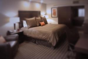 Letto o letti in una camera di Aspen Select