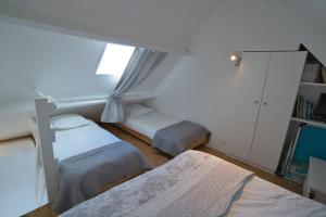 Posteľ alebo postele v izbe v ubytovaní Duplex en bord de mer