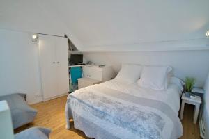Posteľ alebo postele v izbe v ubytovaní Duplex en bord de mer