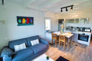 Kuchyňa alebo kuchynka v ubytovaní Duplex en bord de mer